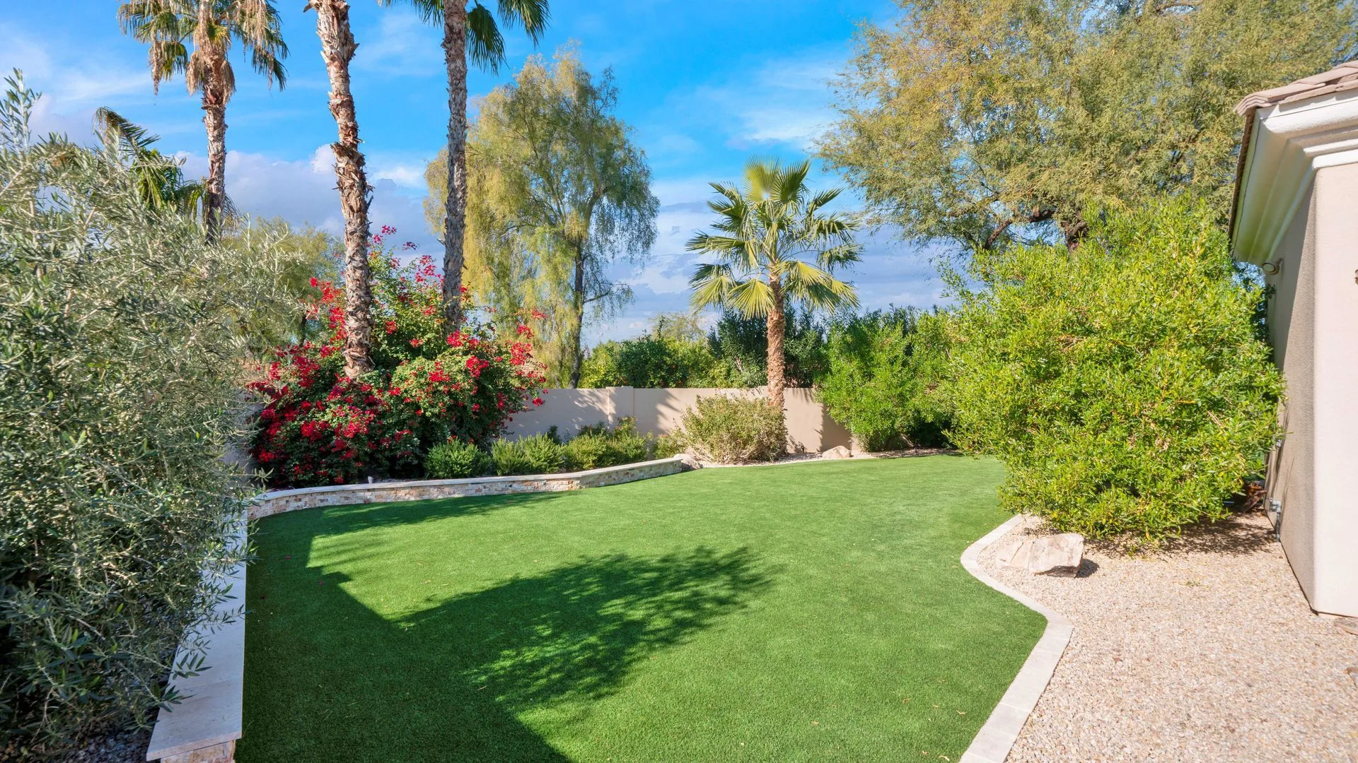 Low-maintenance desert landscape with hardscaping and drought-tolerant plants