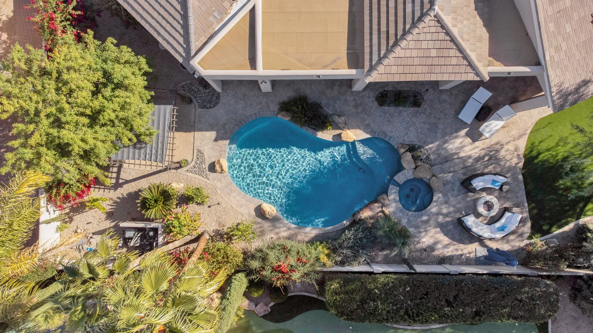 Aerial of a custom Phoenix property with multiple landscape features