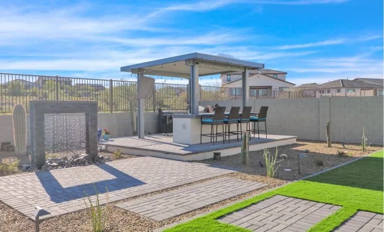 Modern pergola with paver patio in a Phoenix backyard